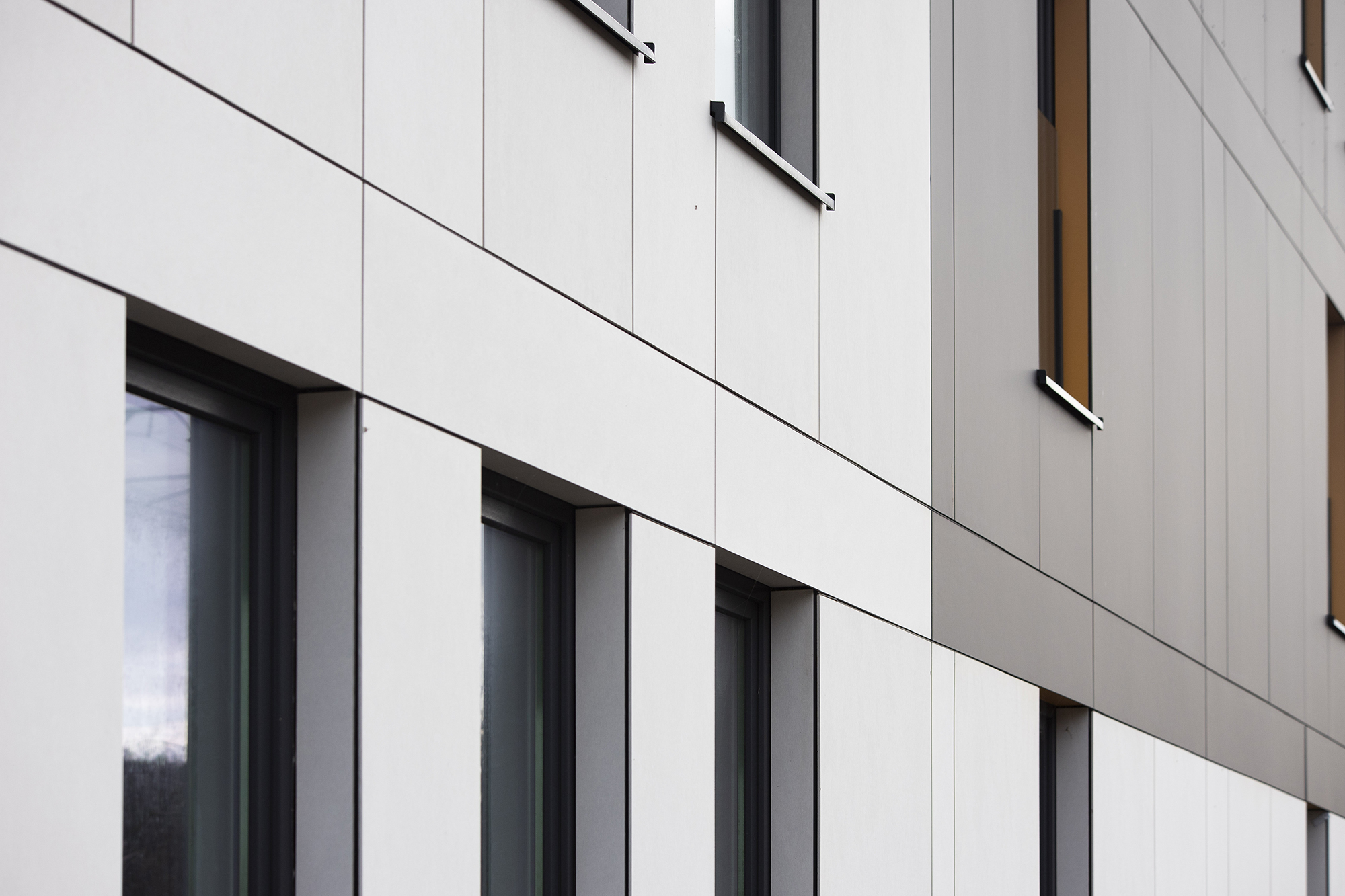 Don’t Settle for HPL: Choose a Façade Material That Performs