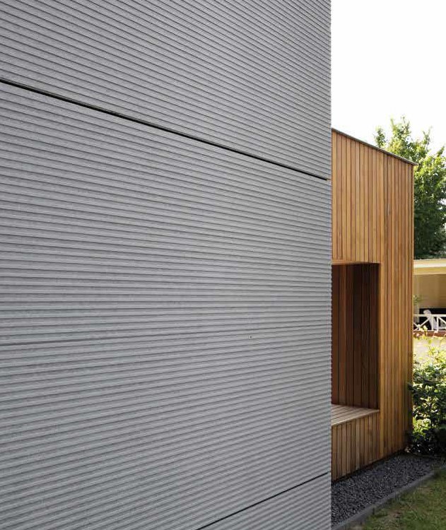 Les panneaux Equitone Linea appliqués sur un Béton Haute Performance permet d'apporter des détails de manière subtile. 