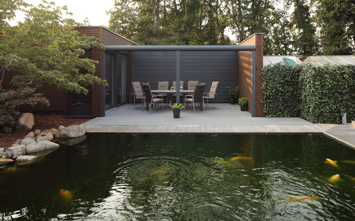 Relaxing at the koi pond on a Cedral Terrace in Sulingen