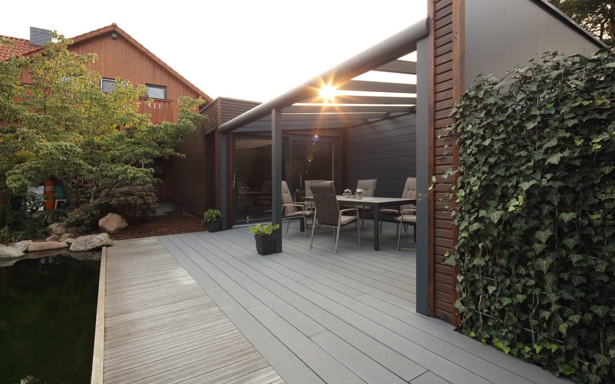 Relaxing at the koi pond on a Cedral Terrace in Sulingen