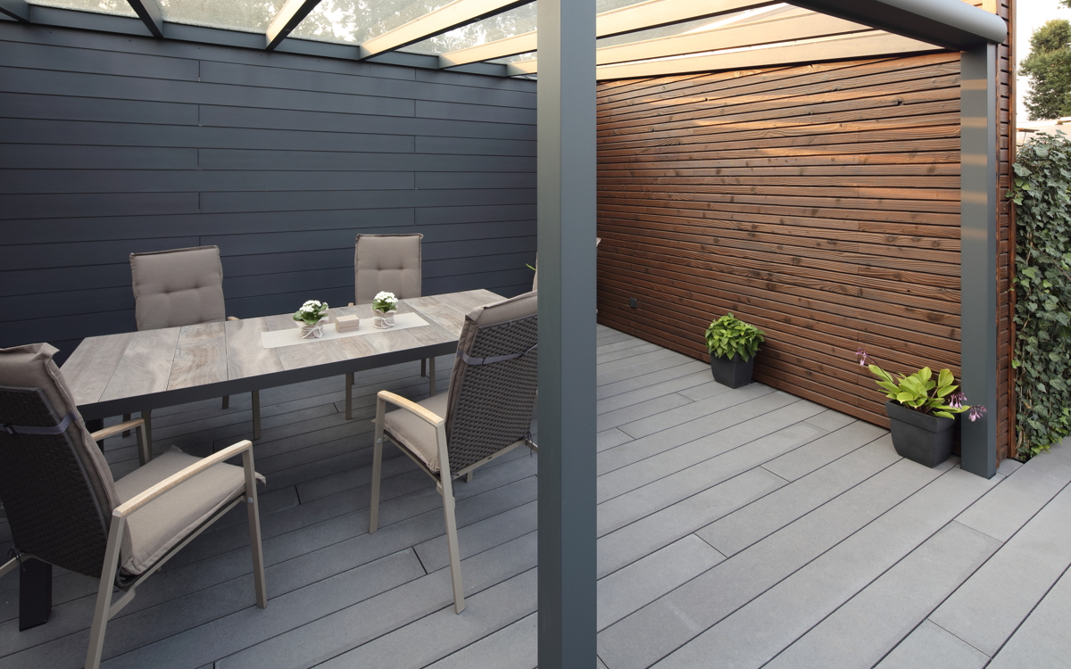 Relaxing at the koi pond on a Cedral Terrace in Sulingen