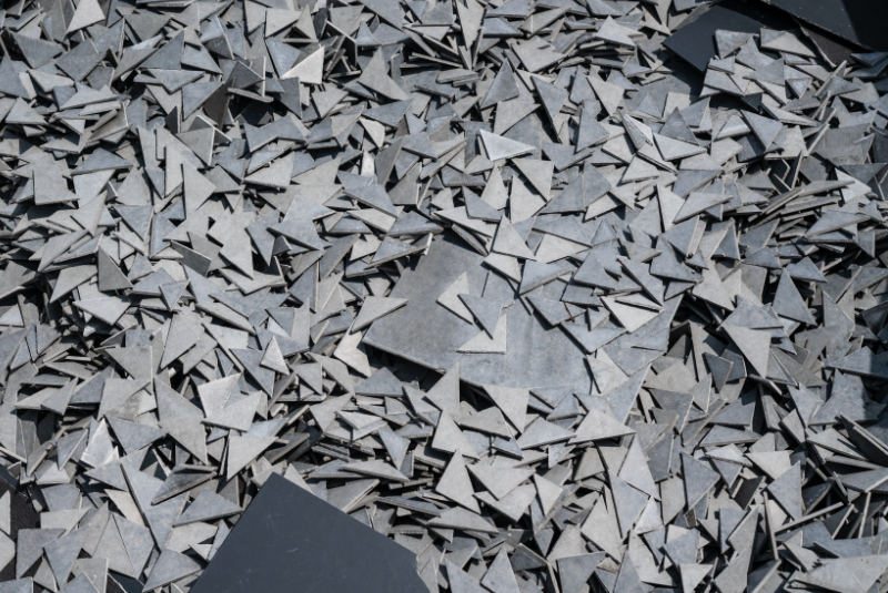 EQUITONE fibre cement offcuts stacked for recycling – visualising material efficiency and low-carbon impact.